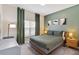 Stylishly decorated bedroom with neutral tones and plenty of natural light at 4184 Paragraph Dr, Kissimmee, FL 34746