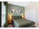 Comfortable bedroom showcasing soothing colors and natural light from the window at 4184 Paragraph Dr, Kissimmee, FL 34746