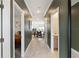 Inviting hallway view showcasing doors to the bathroom, bedroom, and living spaces at 4184 Paragraph Dr, Kissimmee, FL 34746