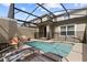 A screened-in pool with lounge chairs offers a refreshing outdoor retreat at 4184 Paragraph Dr, Kissimmee, FL 34746