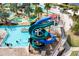 Enjoy the outdoor community waterpark featuring an exciting enclosed green and blue spiral water slide at 4184 Paragraph Dr, Kissimmee, FL 34746