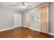 Bright bedroom featuring light decor, a closet, and natural light from the window at 465 W Lakeshore Dr, Clermont, FL 34711