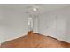 A bright bedroom with wood floors, white trim, and a ceiling fan at 4756 Fiske Cir, Orlando, FL 32826