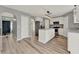 Bright kitchen featuring stainless steel appliances, a center island, and hardwood style flooring at 4756 Fiske Cir, Orlando, FL 32826