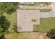 Bird's eye view of the home showing the roof, landscaping, and driveway at 4770 Drummond Ln, Orlando, FL 32810