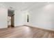Bright bedroom featuring wood-look flooring, recessed lighting, and a ensuite bathroom at 4770 Drummond Ln, Orlando, FL 32810