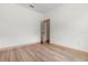 Bedroom showcasing new flooring, neutral paint, and an open door at 4770 Drummond Ln, Orlando, FL 32810