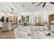 The open-concept living area featuring a kitchen, dining area, and a living area at 4770 Drummond Ln, Orlando, FL 32810