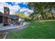 Inviting backyard patio with comfortable seating, perfect for entertaining or relaxing outdoors at 493 Princewood Dr, Deland, FL 32724