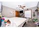 Cozy bedroom features carpeted floors, a ceiling fan, and a window, creating a warm and inviting space at 493 Princewood Dr, Deland, FL 32724
