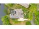 Desirable home featuring lush landscaping and a private screened-in pool at 5241 Vista Club Run, Sanford, FL 32771