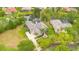 Expansive property with meticulously landscaped grounds and a screened-in pool at 5241 Vista Club Run, Sanford, FL 32771