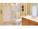 Bathroom featuring glass shower, vanity with sink, and toilet at 5241 Vista Club Run, Sanford, FL 32771