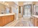 Luxurious bathroom with soaking tub, walk-in shower, and dual vanities at 5241 Vista Club Run, Sanford, FL 32771