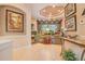 Elegant living room features coffered ceiling, fireplace, and picture window at 5241 Vista Club Run, Sanford, FL 32771