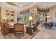 Spacious living room with custom built-ins, fireplace, and multiple seating areas at 5241 Vista Club Run, Sanford, FL 32771