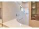 Shower with tile surround, grab bar, and built in niche for toiletries at 5241 Vista Club Run, Sanford, FL 32771