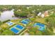 Areal view of tennis courts and basketball court in a well maintained Community setting at 5241 Vista Club Run, Sanford, FL 32771