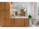 Bathroom featuring beautiful cabinets with granite countertops at 5351 Carson St, St Cloud, FL 34771