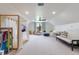 Spacious bonus room featuring bright lighting, a ceiling fan, and an open floor plan at 5351 Carson St, St Cloud, FL 34771