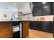 View of kitchen and stainless steel appliance and spacious island with drawer and cabinet storage at 5351 Carson St, St Cloud, FL 34771