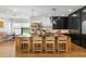 Spacious kitchen with a large island, modern appliances, and stylish pendant lighting at 5351 Carson St, St Cloud, FL 34771