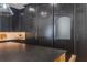 Modern kitchen features black cabinetry, large island, and stainless steel appliances at 5351 Carson St, St Cloud, FL 34771