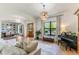 Spacious living room with hardwood floors, ample natural light, and an open layout at 5351 Carson St, St Cloud, FL 34771