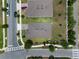 An aerial view shows the manicured lawns and well-maintained rooftops of the surrounding residences at 5515 Palomino Pl, Apopka, FL 32712