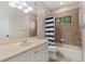 Bathroom featuring a tub and shower combination, vanity, and tile floors at 6149 Blakeford Dr, Windermere, FL 34786