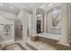 This bathroom offers tile flooring, a soaking tub and a glass enclosed shower at 6149 Blakeford Dr, Windermere, FL 34786