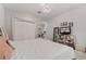 Bedroom featuring an ensuite bathroom, closet space, and light colored walls at 6149 Blakeford Dr, Windermere, FL 34786