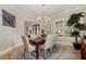 Dining room features a modern chandelier and plenty of natural light at 6149 Blakeford Dr, Windermere, FL 34786