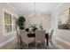 Dining room boasts a modern chandelier and lots of natural light at 6149 Blakeford Dr, Windermere, FL 34786