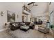 Spacious living room featuring two-story ceiling, balcony, and open concept floor plan at 6149 Blakeford Dr, Windermere, FL 34786