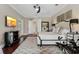 Bright and airy main bedroom with hardwood floors, a ceiling fan, and a modern aesthetic, creating a relaxing atmosphere at 6149 Blakeford Dr, Windermere, FL 34786