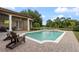 Stunning pool with a spa and a covered patio perfect for outdoor entertaining and relaxation at 6149 Blakeford Dr, Windermere, FL 34786