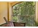 Private balcony featuring peaceful outdoor views of the surrounding landscape at 6335 Contessa Dr # 208, Orlando, FL 32829