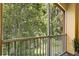 Balcony view overlooking the lush greenery at 6335 Contessa Dr # 208, Orlando, FL 32829