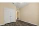 Spacious bedroom with modern wood floors and natural light at 6335 Contessa Dr # 208, Orlando, FL 32829