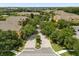 A welcoming community entrance to the Horizon at Vista Lakes with meticulously maintained landscaping at 6335 Contessa Dr # 208, Orlando, FL 32829