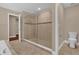 Bathroom with a large shower stall, toilet, and neutral colors at 8348 Vivaro Isle Way, Windermere, FL 34786