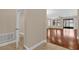 Open-concept living space with hardwood floors and neutral paint, blending elegance and comfort at 8348 Vivaro Isle Way, Windermere, FL 34786