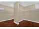 Spacious walk-in closet with hardwood floors and ample shelving at 8348 Vivaro Isle Way, Windermere, FL 34786