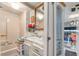 Bathroom boasts a vintage cabinet, a marble countertop sink, and a shower/tub combo, exuding charm at 9000 Us Highway 192 # 115, Clermont, FL 34714