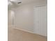 Bright bedroom with carpeted floor and large closet at 957 Yellow Rose Dr, Orlando, FL 32818