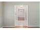 Living room featuring hardwood floors and chandelier lighting at 957 Yellow Rose Dr, Orlando, FL 32818