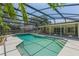 Relax in this refreshing pool, fully screened for privacy and comfort, steps away from the home's back door at 957 Yellow Rose Dr, Orlando, FL 32818