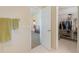 View to walk-in closet and main bedroom featuring tile flooring at 957 Yellow Rose Dr, Orlando, FL 32818
