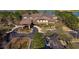 Aerial view of the community clubhouse, showcasing its grand entrance and manicured surroundings at 9846 Sw 106Th Ct Ocala, F, Ocala, FL 34481